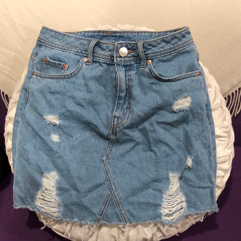 Distressed denim skirt